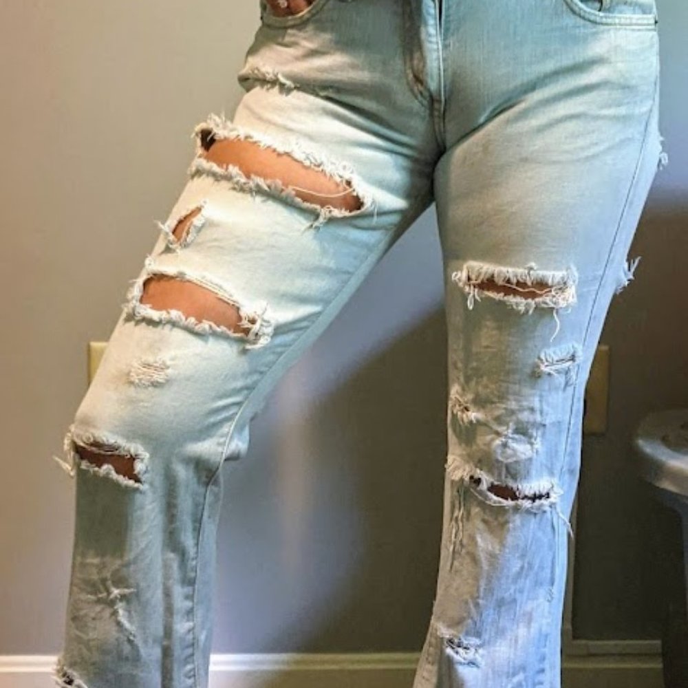 Vintage Levi's 518 with rips Size 11M